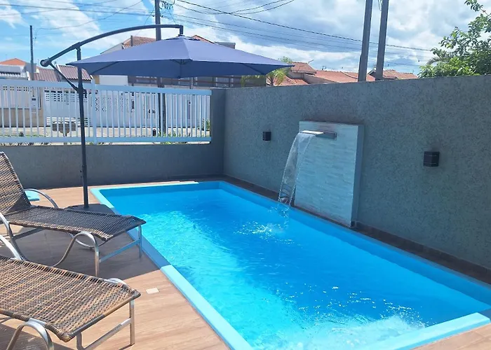 Mar Doce Lar Casa na praia de guaratuba com piscina e ar condicionado
